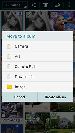Where are my photos and videos stored on my Samsung Note?, and can I move them?