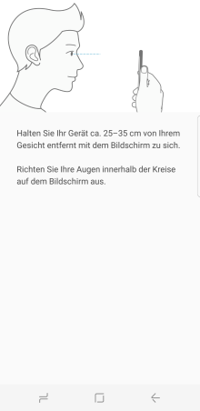 Positionieren Sie Ihre Augen innerhalb der Kreise auf dem Bildschirm damit die Kamera für die Iriserkennung mit dem Scannen beginnt