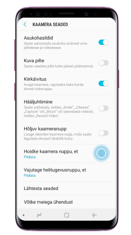 Puudutage ‘Hoia kaamera nuppu kuni’
