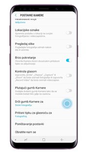 Dodirnite gumb „Drži gumb kamere za“