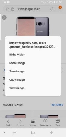 Fra Internet: Trykk og hold et bilde og velg Bixby Vision