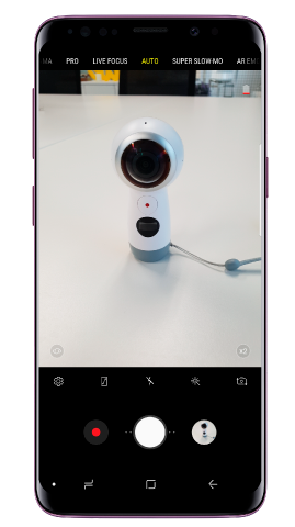Wybierz tryb automatyczny i naciśnij przycisk Bixby Vision wyświetlony nad ikoną ustawień