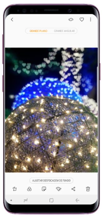 Selecione uma foto tirada com a funcionalidade Live Focus e toque em Ajustar desfocagem de fundo