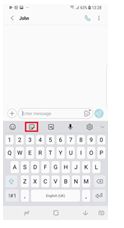 På Samsung-tangentbordet trycker du på Emoji-knappen