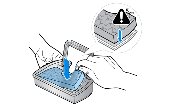 Putting the sponge and the filter back into the dust pack.