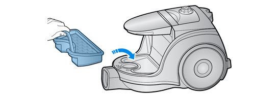 Putting the assembled dust pack back into the main body of the vacuum cleaner.