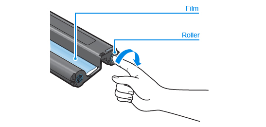Rotating the roller to smooth wrinkles or uneven areas in the film.